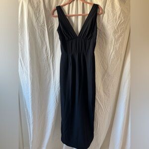 True Vintage Chic Little Black Dress with Deep V Neckline